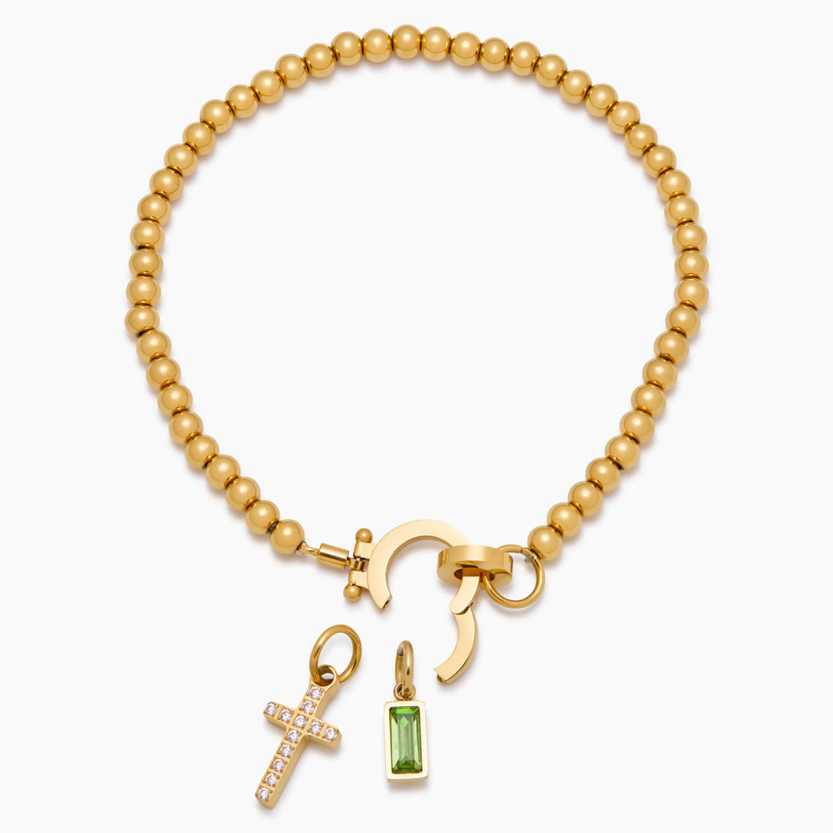 Beaded bracelet with a birthstone and cross charm