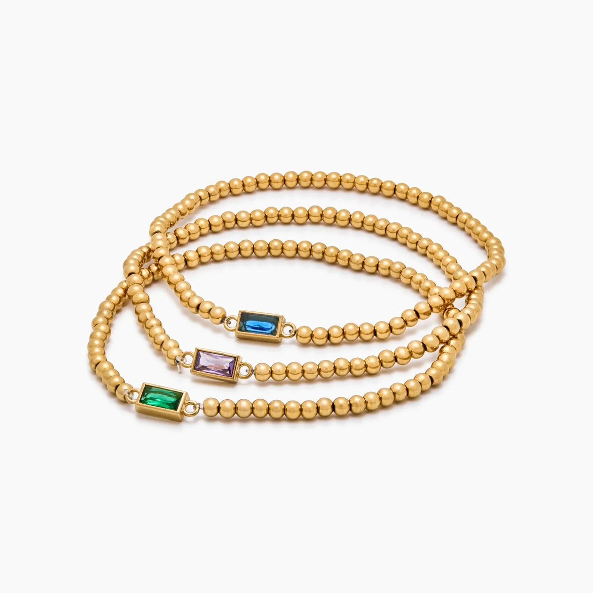 Gold beaded bracelet with a birthstone