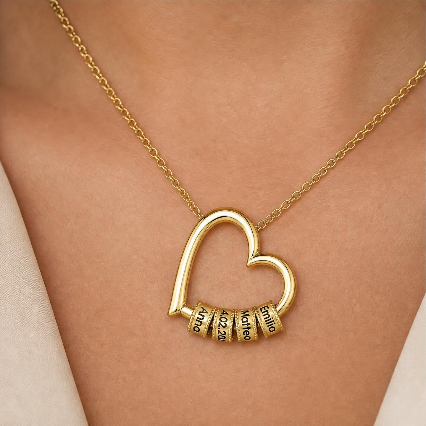 Personalized necklace with a heart and engraved pendants